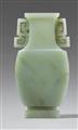 A pale celadon jade archaistic vase. Qing dynasty - image-1