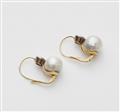 A pair of 18k gold diamond and South Sea cultured pearl earrings. - image-2