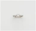An 18k white gold and diamond solitaire ring. - image-1