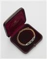A German 14k gold diamond and natural Columbian emerald chain bracelet. - image-1