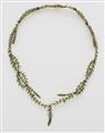 A 14k gold and translucent enamel pine cone necklace. - image-1