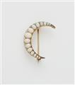 A 14k gold opal and diamond crescent moon brooch. - image-1