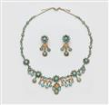 An 18 kt gold diamond and turquoise suite comprising a fringe necklace and a pair of pendant earrings. - image-1