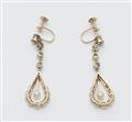 A pair of Belle Epoque 14k gold diamond and pearl pendant earrings. - image-2