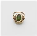A 14k gold and green tourmaline ring. - image-2