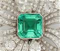 An 18k white gold diamond rosette brooch with a fine Columbian emerald and milanaise meshwork necklace. - image-2