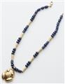 A 20k gold lapis lazuli necklace with a frog pendant in Pre-Columbian style. - image-2