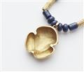 A 20k gold lapis lazuli necklace with a frog pendant in Pre-Columbian style. - image-3
