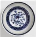A Meissen porcelain tea bowl with a flower mark - image-2