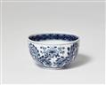 A Meissen porcelain tea bowl with a flower mark - image-1