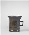 A small single-handled mortar dated 1728 - image-1