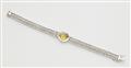 An 18k gold diamond and yellow sapphire bracelet (former cocktail watch). - image-2