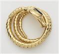 A flexible 18 kt gold diamond and green tourmaline snake bracelet. - image-2