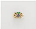 An 18k gold sapphire and emerald cabochon band ring. - image-1