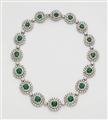 A German platinum diamond and emerald cocktail necklace. - image-1