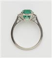 A platinum diamond and fine Columbian emerald ring. - image-2