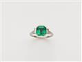 A platinum diamond and fine Columbian emerald ring. - image-1