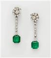 A pair of 18k gold diamond and emerald cocktail earrings. - image-1