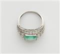 A platinum diamond and carré-cut emerald ring. - image-2