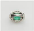 A platinum diamond and carré-cut emerald ring. - image-3