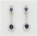 A pair of German 18k white gold diamond and sapphire pendant earrings with stud-clip mount. - image-1