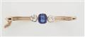 A Belle Epoque 14k rose gold, diamond and sapphire bangle. - image-2