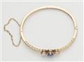 A Belle Epoque 14k rose gold, diamond and sapphire bangle. - image-3