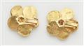 A pair of 14k gold floral clip earrings. - image-2