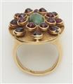 A German 18k gold green tourmaline and garnet gentleman's ring. - image-3