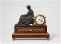 A Parisian gilt and patinated bronze pendulum clock with a seated figure of Fate - image-1