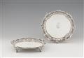 A pair of George III London silver salvers - image-1