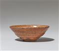 An oval-shaped aka raku chawan. Kyoto. 18th century - image-2