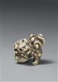 A Kyoto school ivory netsuke of a roaring shishi. Early 19th century - image-1