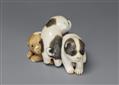 An ivory netsuke of three piebald puppies. Mid-19th century - image-1