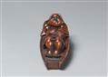 A boxwood netsuke of Hotei resting in a boat. Late 19th century - image-4