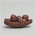 A boxwood netsuke of Hotei resting in a boat. Late 19th century - image-9