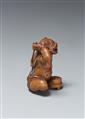 A large boxwood okimono netsuke of a laughing oni. Late 19th century - image-4