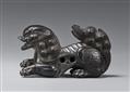 A large kokutan netsuke of a shishi. 19th century - image-3