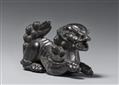 A large kokutan netsuke of a shishi. 19th century - image-1