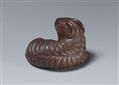 An Ise-Yamada boxwood netsuke of a long-haired goat. Around 1970 - image-2