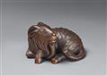 An Ise-Yamada boxwood netsuke of a long-haired goat. Around 1970 - image-1