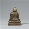 A bronze figure of a Gelugpa lama. Tibet, 17th/18th century - image-2