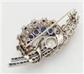 A 14k white gold diamond and sapphire Retro Style brooch with a ca. 1.85 ct European old-cut diamond. - image-2