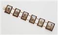 An 18k gold and polychrome glass micromosaic souvenir bracelet depicting Roman views. - image-1