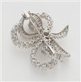 A French 18k gold platinum and diamond bow brooch. - image-2