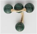 A pair of 18k gold and malachite ball cufflinks. - image-2