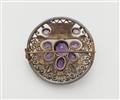 A gilded silver enamel pearl and amethyst disc brooch. - image-2