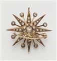 A late 19th century 14 k gold and diamond star brooch. - image-2