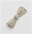 A Belle Epoque platinum diamond and pearl bow brooch. - image-1