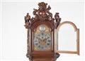A museum quality longcase clock with a carved Vanitas still life - image-2
